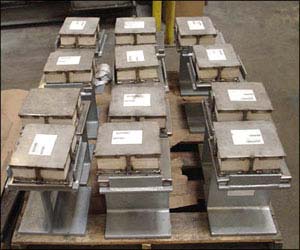 Slide Plate Assemblies with Marinite Insulation and Vibration Pads Slide Plate Assemblies with Marinite Insulation and Vibration Pads