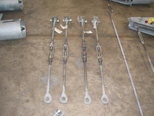 Welded beam attachments in trunbuckle assembly