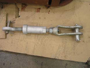 Forged clevis with adjustable strut