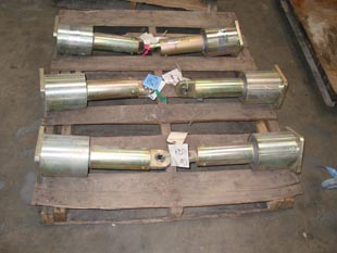 Custom coated hydraulic snubbers