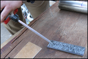 Applying epoxy adhesive to FRP Pad