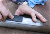 Firmly press FRP pad to spread the epoxy out